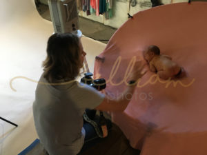 alt="newborn baby girl photo session behind the scenes"