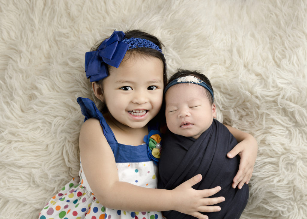 Newborn Photography with sibling