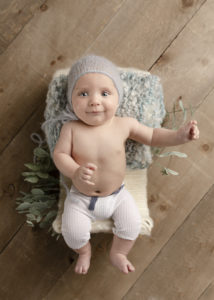 3 month old baby in a bonnet Calgary baby photographer Belliam Photos