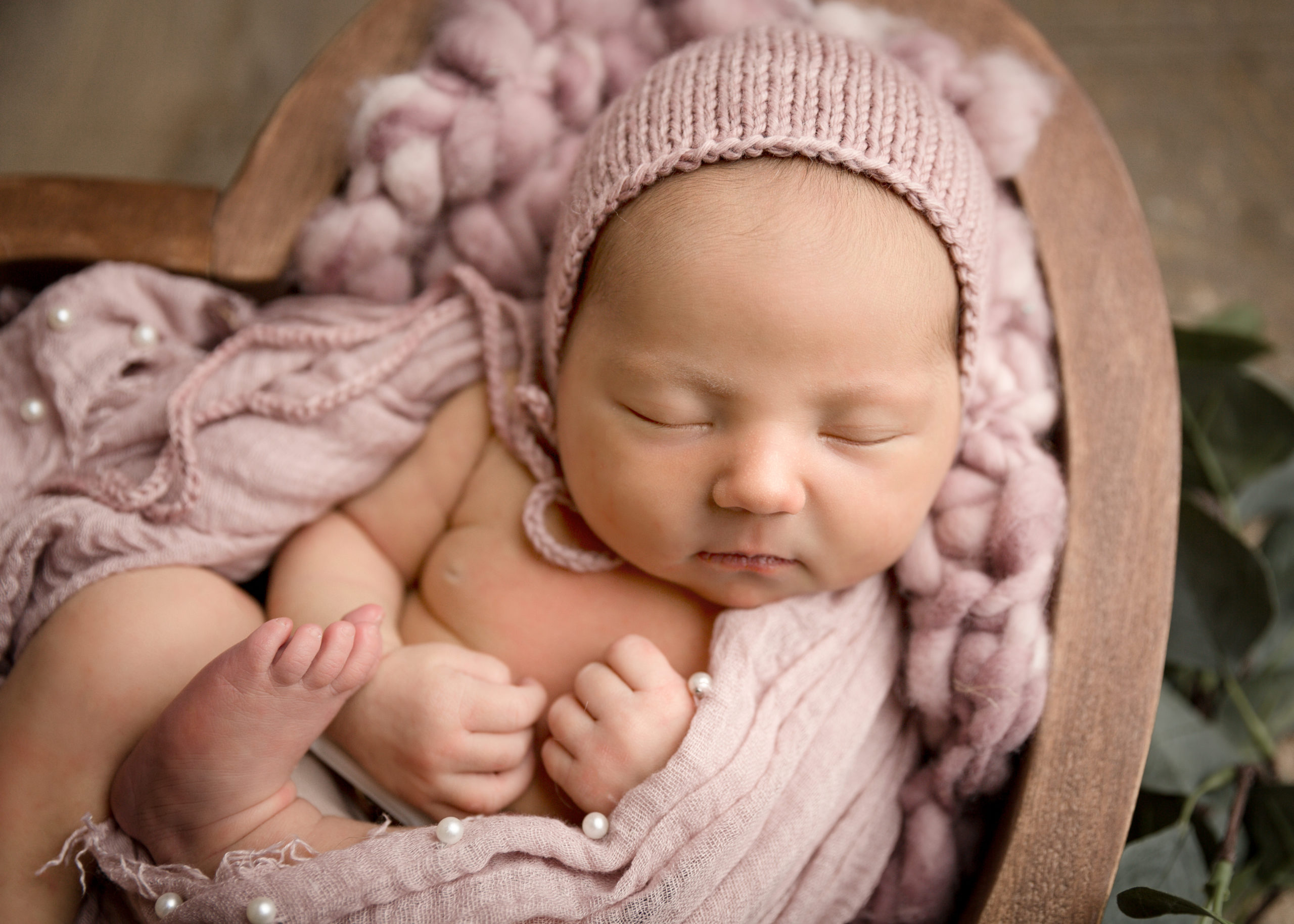 newborn baby girl in pink