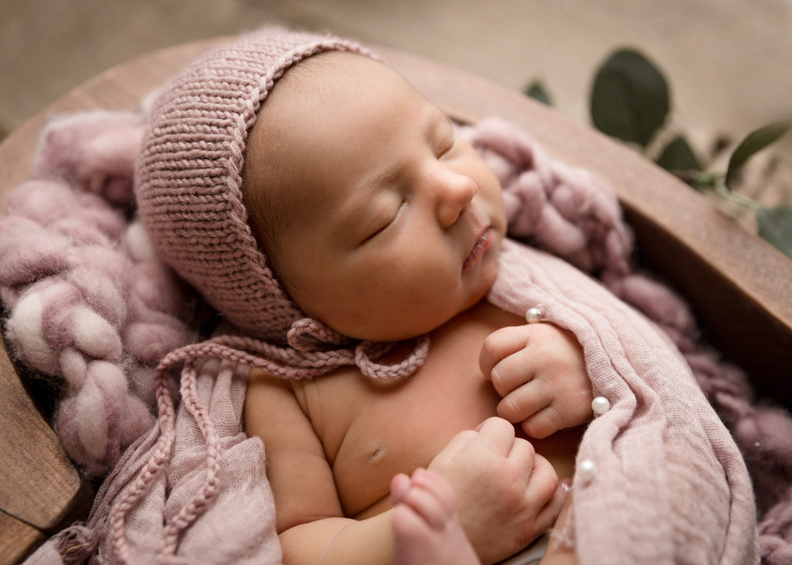 newborn baby girl in pink