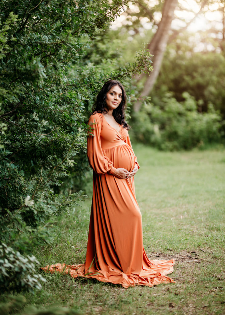 Pregnant Woman in orange gown
